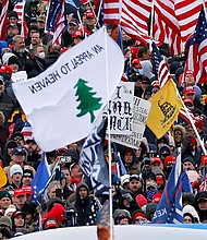 An "Appeal to Heaven" flag is seen among a crowd of supporters of President Donald Trump in Washington, D.C. on January 6, 2021.
Mandatory Credit:	CArlos Barria/Reuters/File via CNN Newsource