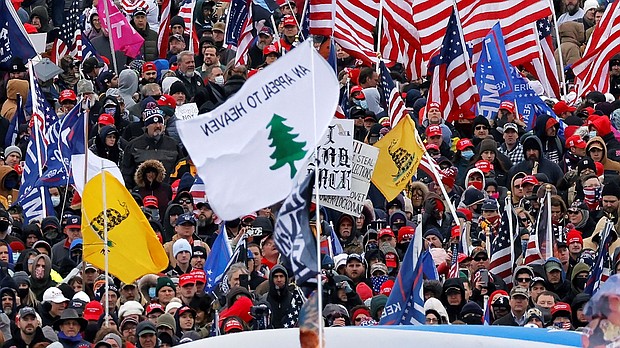 An "Appeal to Heaven" flag is seen among a crowd of supporters of President Donald Trump in Washington, D.C. on January 6, 2021.
Mandatory Credit:	CArlos Barria/Reuters/File via CNN Newsource