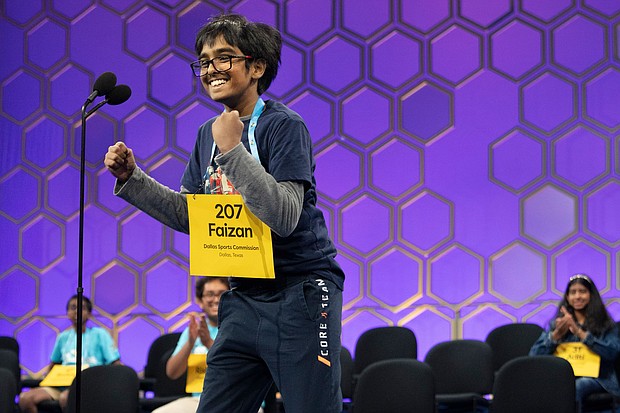 Faizan Zaki, 12, of Allen, Texas, reacts after spelling his final word correctly during the semifinals of the Scripps National Spelling Bee on Wednesday.
Mandatory Credit:	Jacquelyn Martin/AP via CNN Newsource