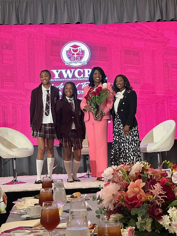 Argentina James, 2024 Dr. Polly Sparks Turner Trailblazer Award Honoree, poses with Dr. Tabitha Davis, Principal of Young Women's College Preparatory Academy in Houston, TX and YWCPA students