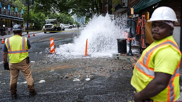 Workers respond to a broken water transmission in Atlanta on June 1. Atlanta officials on Thursday morning lifted the last boil water advisory put in place.
Mandatory Credit:	Mike Stewart/AP via CNN Newsource