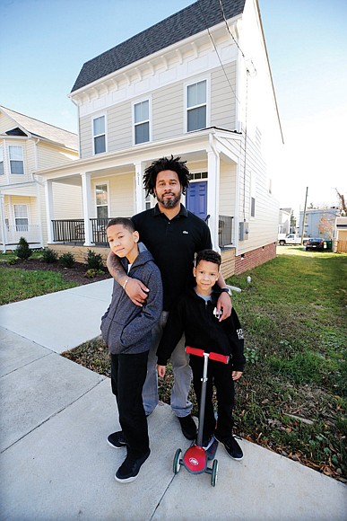 An owner of one of the homes sold by the Maggie Walker Community Land Trust.