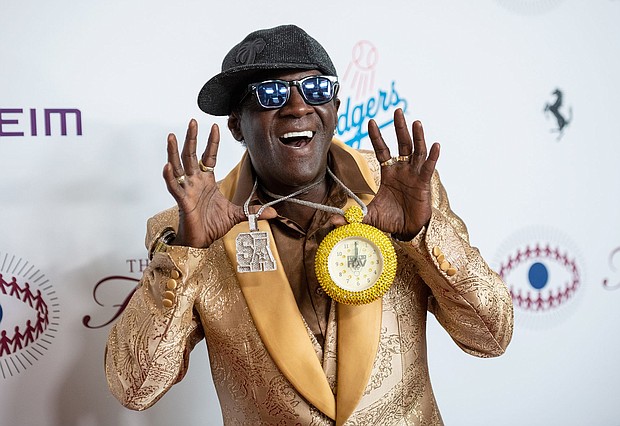 Rapper Flavor Flav is getting behind the US women's water polo team at the Paris Olympics.
Mandatory Credit:	Amanda Edwards/Getty Images via CNN Newsource
