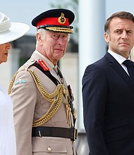 King Charles and Queen Camilla were joined by French President Emmanuel Macron and his wife Brigitte Macron at the British Normandy Memorial.
Mandatory Credit:	Chris Jackson/Getty Images via CNN Newsource