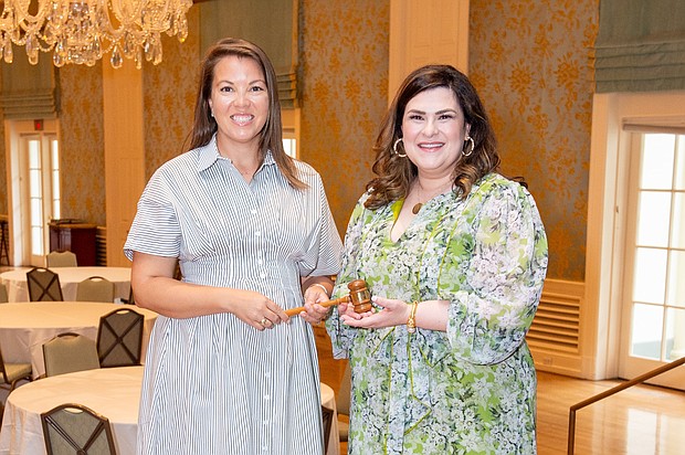 Amanda Hanks Bayles Passing Gavel to Mary Lee Wilkens