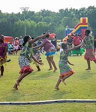 Akoma De Gado dancers perform during  Henrico County's Juneteenth celebration in Dorey Park.  Brittany Powell