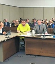 Anderson Lee Aldrich, center, sits during a court appearance in Colorado Springs in November 2022. Aldrich is set to be sentenced for federal hate crime charges and firearm violations on June 18.
Mandatory Credit:	El Paso County District Court/AP via CNN Newsource
