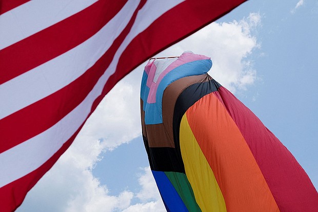 The U.S. and Rainbow flag blows in Franklin, Tennessee, in June 2023. A federal judge ruled on June 17 that the Biden administration cannot enforce new protections for LGBTQ+ students in Ohio, Virginia and four other states.
Mandatory Credit:	Kevin Wurm/Reuters via CNN Newsource