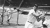 Willie Mays takes a batting practice swing on June 24, 1954, in New York. The outfielder, who was considered baseball’s greatest living player, died on Tuesday.