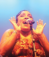 Kaila Valdez of Legacy Band sings with passion as the city gathered for the celebration of freedom.