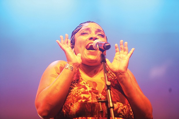 Kaila Valdez of Legacy Band sings with passion as the city gathered for the celebration of freedom.