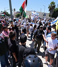 Supporters of Israel clashed with pro-Palestinian protesters in front of the Adas Torah synagogue, in Los Angeles on June 23.
Mandatory Credit:	David Swanson/AFP/Getty Images via CNN Newsource
