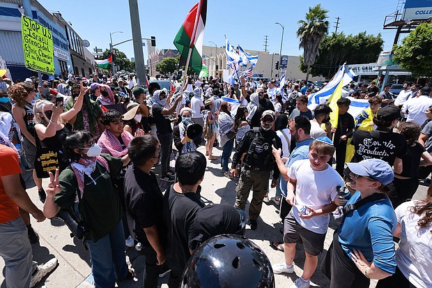 Supporters of Israel clashed with pro-Palestinian protesters in front of the Adas Torah synagogue, in Los Angeles on June 23.
Mandatory Credit:	David Swanson/AFP/Getty Images via CNN Newsource