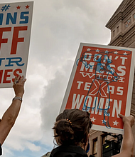 Demonstrators hold signs outside the Texas State Capitol during a women's march in Austin, Texas. A new study has drawn a possible link between rising infant mortality in Texas and the state’s abortion restrictions.
Mandatory Credit:	Sarah Karlan/Bloomberg/Getty Images/File via CNN Newsource