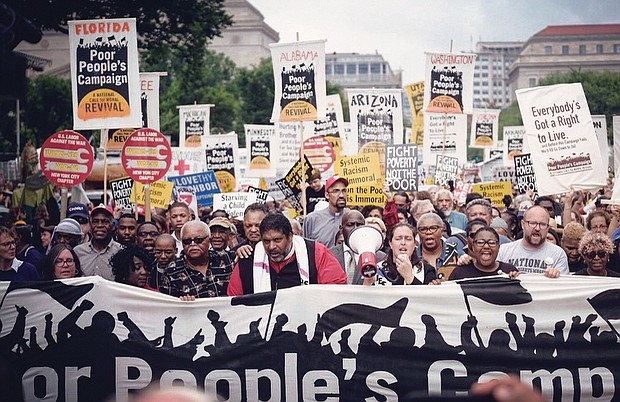 The Rev. William J. Barber II, center, leads a rally in Washington, D.C. in 2019.