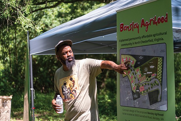 Duron Chavis explains the initial proposal June 23 at the Bensley Agrihood Service Day and Speakout.