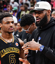 LeBron James has spoken of his desire to play in the NBA with his son, Bronny. Alex Bierens de Haan/Getty Images