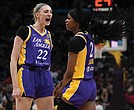 Los Angeles Sparks forward Cameron Brink, left, reacts after forward Rickea Jackson drew a foul during a June 9 game against the Las Vegas Aces in Los Angeles.