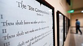 A copy of the Ten Commandments is posted along with other historical documents in a hallway at the Georgia Capitol in Atlanta. Louisiana has become the first state in the country to require the Ten Commandments be displayed in all public schools.