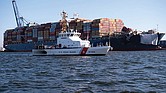 This image provided by the U.S. Coast Guard shows the U.S. Coast Guard Cutter Sailfish, an 87-foot Marine Protector class vessel, as it prepares June 24, to escort the Motor Vessel Dali from the Port of Baltimore to the Port of Virginia.