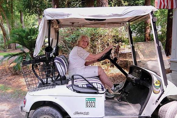 Karen Dove Barr parked her cart next to a “Golfers Only” sign. Up ahead, men in khaki shorts and polo …