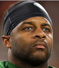 Cobb looks on prior to an NFL game against the Cleveland Browns. Cooper Neill/Getty Images