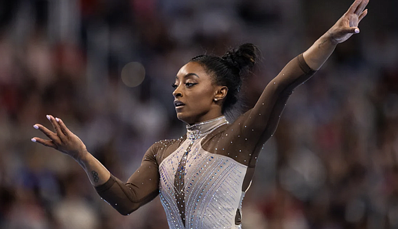 Simone Biles is looking to book her spot at a third Olympic Games this week when the US Olympic Gymnastics …