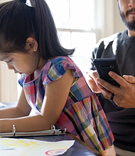 Using a phone in front of your child can have a greater effect than you might think. MoMo Productions/Digital Vision/Getty Images