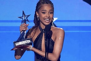 Tyla accepts accepts the award for best international act during the BET Awards on Sunday, June 30, 2024, at the Peacock Theater in Los Angeles. Chris Pizzello/Invision/AP