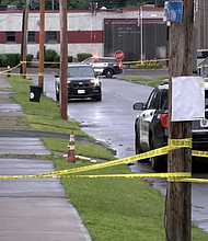 Police investigate the scene of a shooting on Friday, June 29, in Utica, New York. WKTV