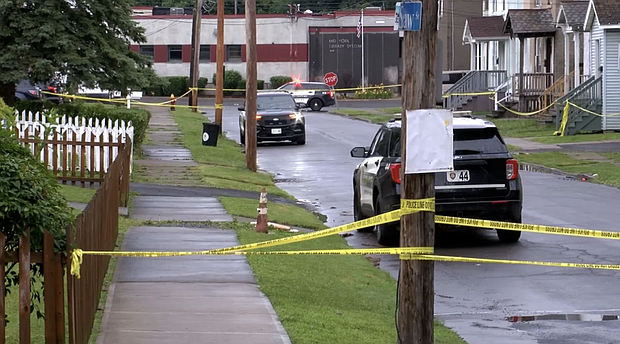 Police investigate the scene of a shooting on Friday, June 29, in Utica, New York. WKTV