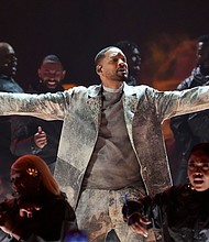 Will Smith, center, performs during the BET Awards on Sunday, June 30, at the Peacock Theater in Los Angeles.
Mandatory Credit:	Chris Pizzello/Invision/AP via CNN Newsource