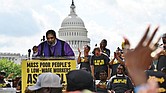 The Rev. William Barber addresses a crowd at a demonstration organized by the Poor People’s Campaign outside the U.S. Capitol on June 29, 2024.