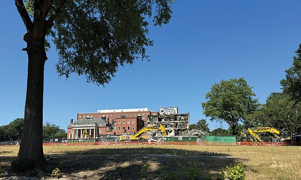 Veritas, a North Side private school, is in the midst of demolishing the former Richmond Memorial Hospital medical buildings at 1311 Palmyra Ave., on Monday, July 1, 2024. According to the school’s website, the project will make way for more green space on their campus. The former
Richmond Memorial Hospital building is now Ginter Place, a condominium community.