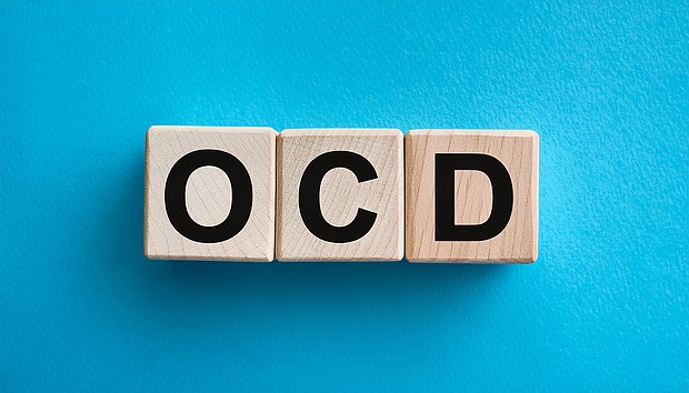 Wood blocks with abbreviation text OCD - Obsessive-Compulsive Disorder. Medicine and healthcare concept. Top view, flat lay.