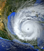hurricane approaching the American continent visible above the Earth, a view from the satellite. Elements of this image furnished by NASA.