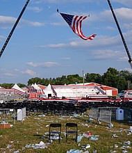 A campaign rally site for former President Donald Trump is empty and littered with debris Saturday, July 13, in Butler, Pennsylvania.
Mandatory Credit:	Evan Vucci/AP via CNN Newsource