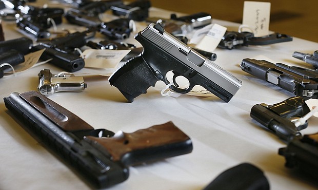 Confiscated guns are stored in the Hennepin County Sheriff’s Office in February 2015, in Minneapolis.
Mandatory Credit:	Jerry Holt/Star Tribune/Getty Images via CNN Newsource