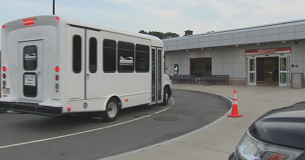 Dozens of migrants got dropped off at the Wollaston MBTA stop in Quincy, Mass. due to overcrowding within the state's emergency shelter program.
Mandatory Credit:	WBZ via CNN Newsource