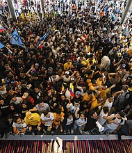 Supporters of Venezuelan opposition presidential candidate Edmundo Gonzalez and opposition leader Maria Corina Machado at the Central University of Venezuela UCV in Caracas on July 14, 2024.
Mandatory Credit:	Pedro Rances Mattey/Anadolu/Getty Images via CNN Newsource