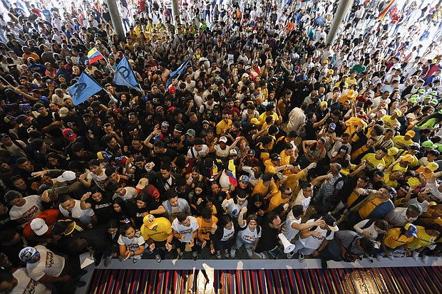 Supporters of Venezuelan opposition presidential candidate Edmundo Gonzalez and opposition leader Maria Corina Machado at the Central University of Venezuela UCV in Caracas on July 14, 2024.
Mandatory Credit:	Pedro Rances Mattey/Anadolu/Getty Images via CNN Newsource