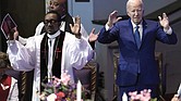 President Biden, right, and Dr. J. Louis Felton worship at a church service at Mt. Airy Church of God in Christ, Sunday, July 7, in Philadelphia.