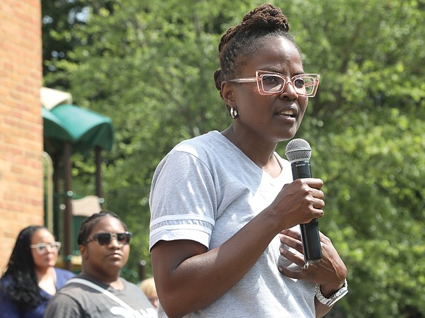 Girls For A Change CEO Angela Patton speaks during the 20th anniversary of the group’s foundational program Camp Diva Leadership Academy last month at Village Green RVA in Chesterfield County.