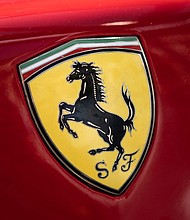 Ferrari is working to maintain the authenticity of its cars and stopping potential fakes into cubes, pictured is the logo of Italian manufacturer of luxury sports cars Ferrari in Modena, Northern Italy.
Mandatory Credit:	Marco Bertorello/AFP via Getty Images via CNN Newsource