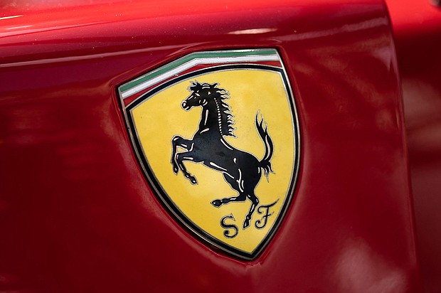 Ferrari is working to maintain the authenticity of its cars and stopping potential fakes into cubes, pictured is the logo of Italian manufacturer of luxury sports cars Ferrari in Modena, Northern Italy.
Mandatory Credit:	Marco Bertorello/AFP via Getty Images via CNN Newsource