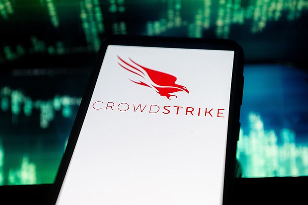 In this photo illustration a Crowdstrike logo seen displayed on a smartphone. The global computer outage affecting airports, banks and other businesses appears to stem at least partly from a software update issued by major US cybersecurity firm CrowdStrike, experts told CNN.
Mandatory Credit:	Mateusz Slodkowski/SOPA Images/LightRocket/Getty Images via CNN Newsource