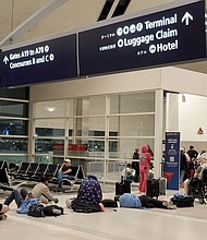 Travelers wait in a long line to speak with a Delta representative at the help desk in the McNamara terminal at the Detroit Metropolitan Wayne County Airport on July 20 in Detroit, Michigan.
Mandatory Credit:	Joe Raedle/Getty Images via CNN Newsource