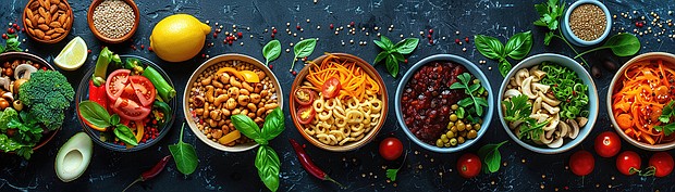 Transform the concept of nutrition innovation into a visually compelling aerial scene Feature a mix of trendy health foods, innovative cooking techniques, and futuristic food products arranged artistically from a birds-eye view, creating a captivating and modern composition