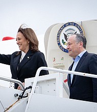 Vice President Kamala Harris, who is pictured with second gentleman Douglas Emhoff at a National Air Guard base on July 22, has secured enough support of Democratic delegates to win the party’s nomination for president.
Mandatory Credit:	Erin Schaff/Pool/AFP/Getty Images via CNN Newsource