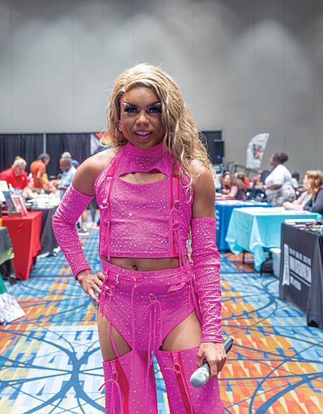 Melanin Monroe, the event’s MC, shows off a stunning pink outfit.